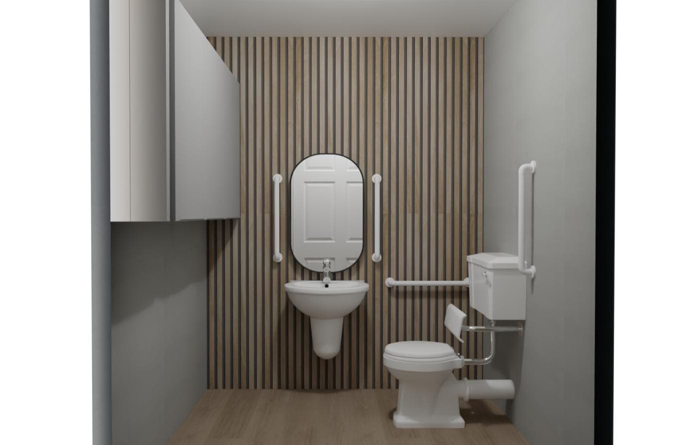 Accessible bathroom with a wall-mounted basin, oval mirror, toilet with grab rails, vertical timber slat feature wall, and light wood flooring. White cupboards are mounted on the left wall.